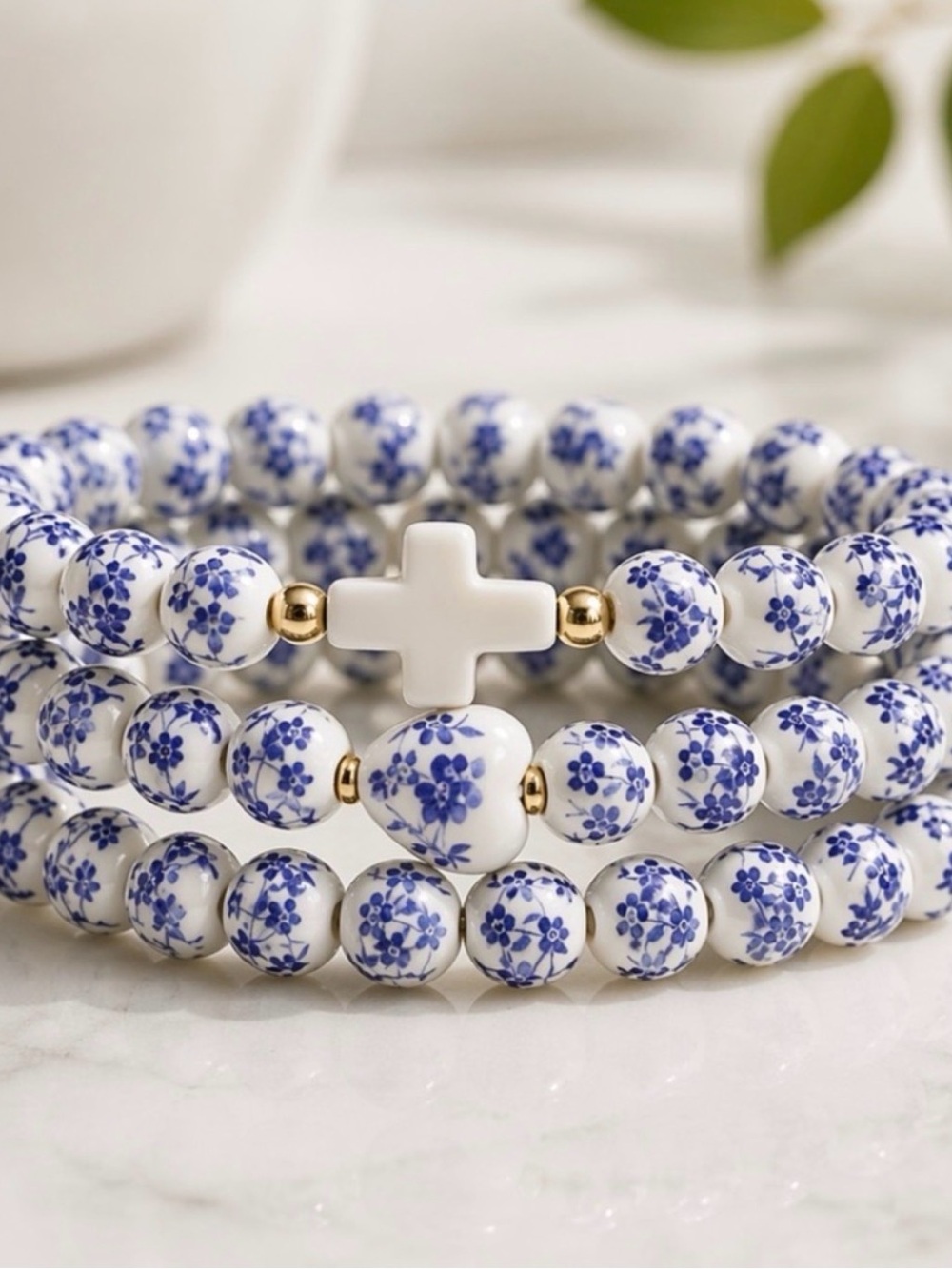 Blue Floral Beaded Stretch Bracelet with White Cross